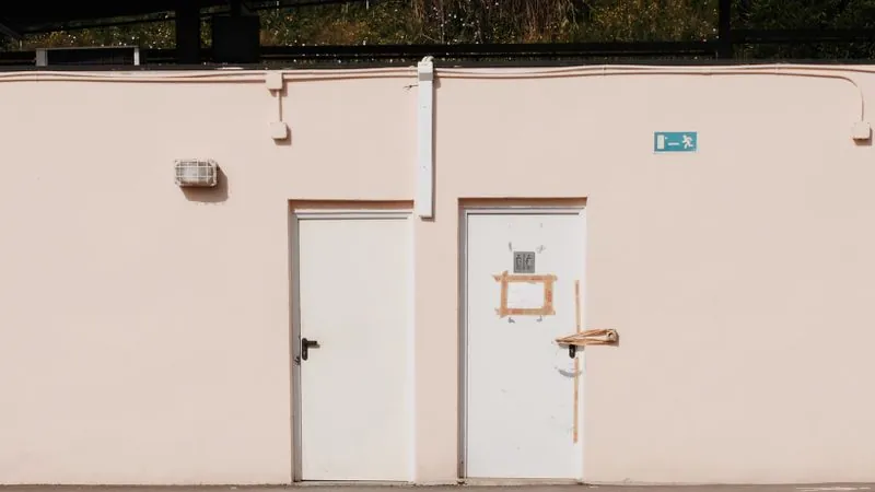 Commercial building exterior with emergency exit doors