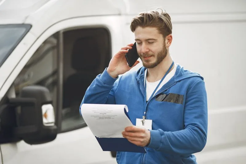 Dispatch team scheduling a garage door repair call